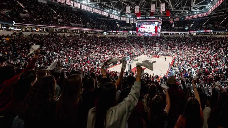 South Carolina fans cheering around the basketball court at Colonial Life Arena