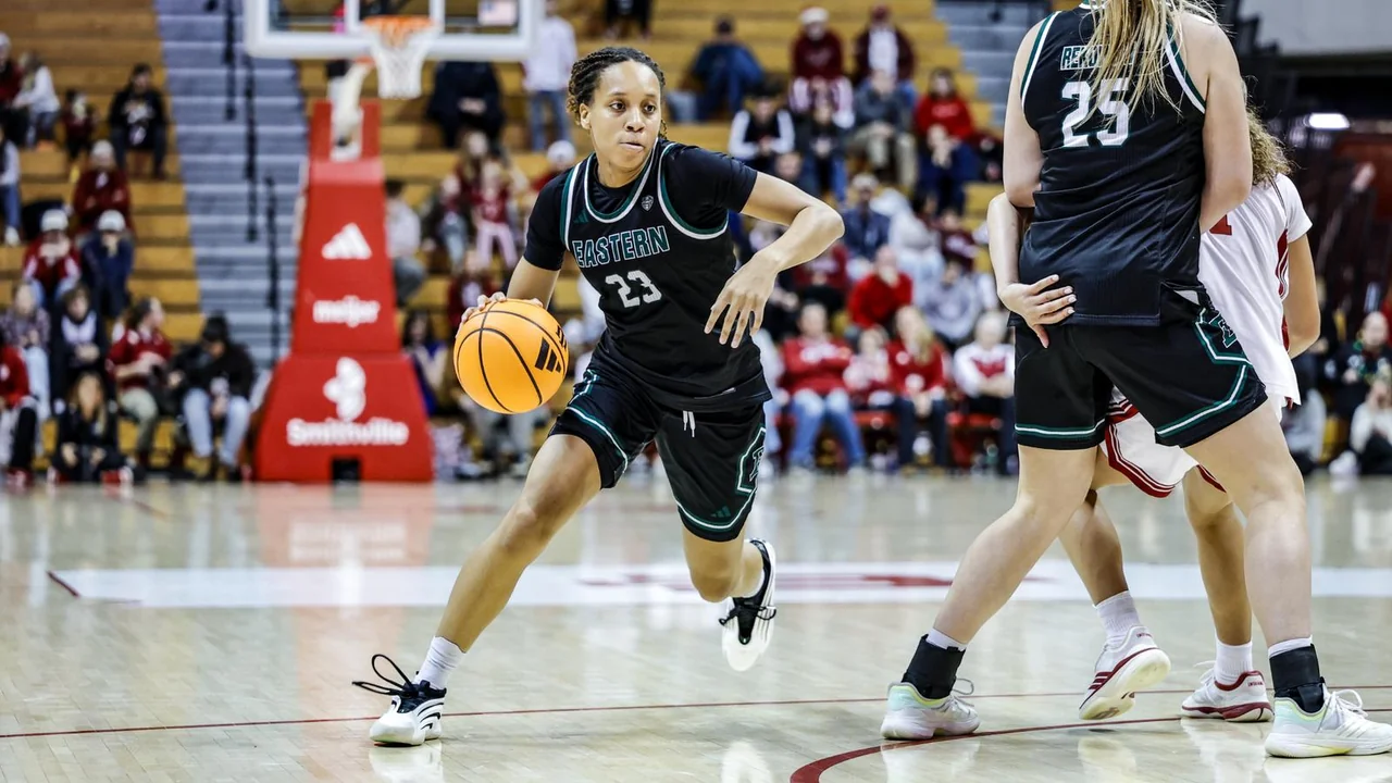 Eastern Michigan Eagles women's basketball: players advancing with the basketball during a game