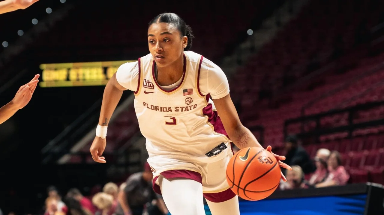 Florida State Seminoles women's basketball: player holding the basketball in a low stance