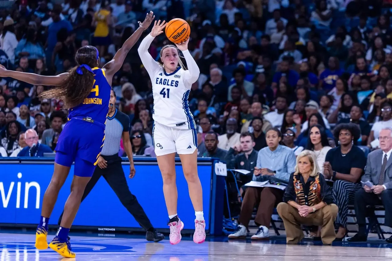 Georgia Southern Eagles women's basketball: player taking a jump shot over a defender