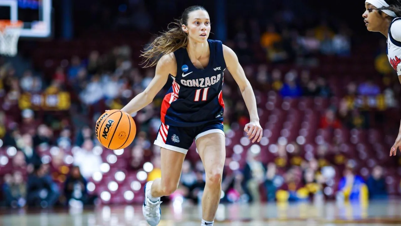 Gonzaga Bulldogs women's basketball: guard dribbling in front of an opponent