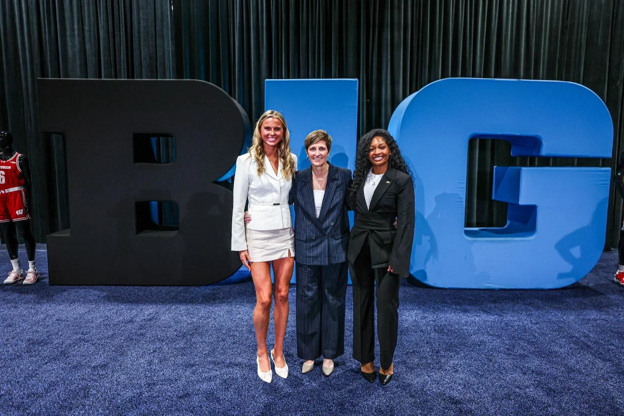 Indiana Hoosiers women's basketball: three representatives posing beside large Big Ten lettering