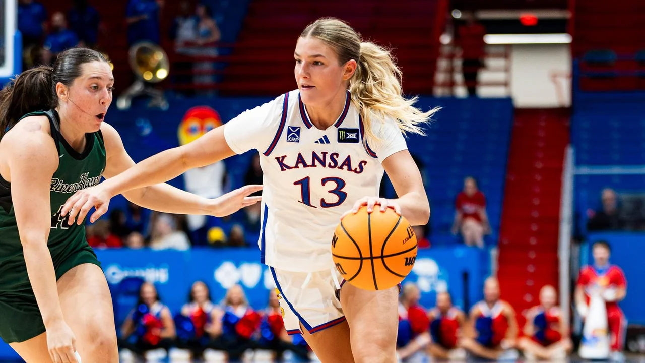 Kansas Jayhawks women's basketball: guard controlling the basketball during a game