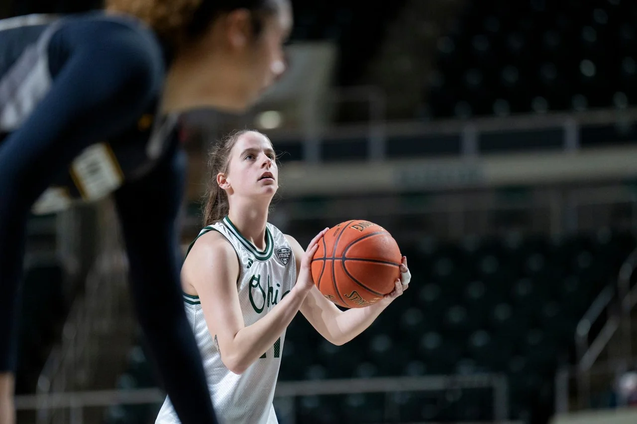Ohio Bobcats women's basketball: player preparing to pass the basketball during a game