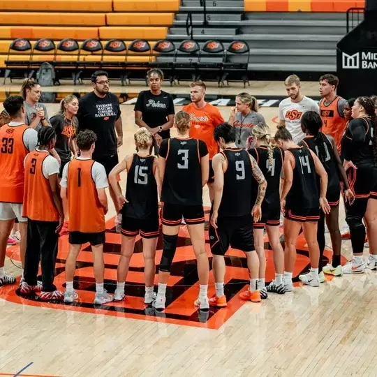 Oklahoma State Cowgirls women's basketball: players gathering in a circle during basketball practice