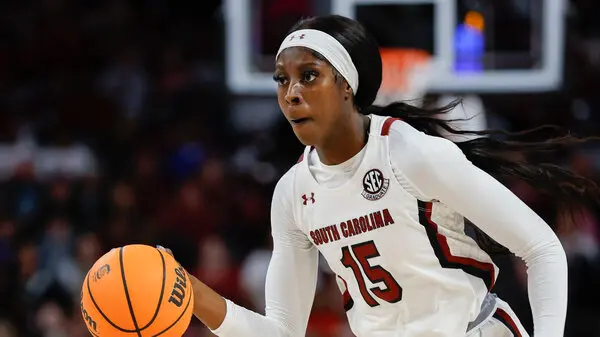 South Carolina Gamecocks guard driving up the court with the ball during a game