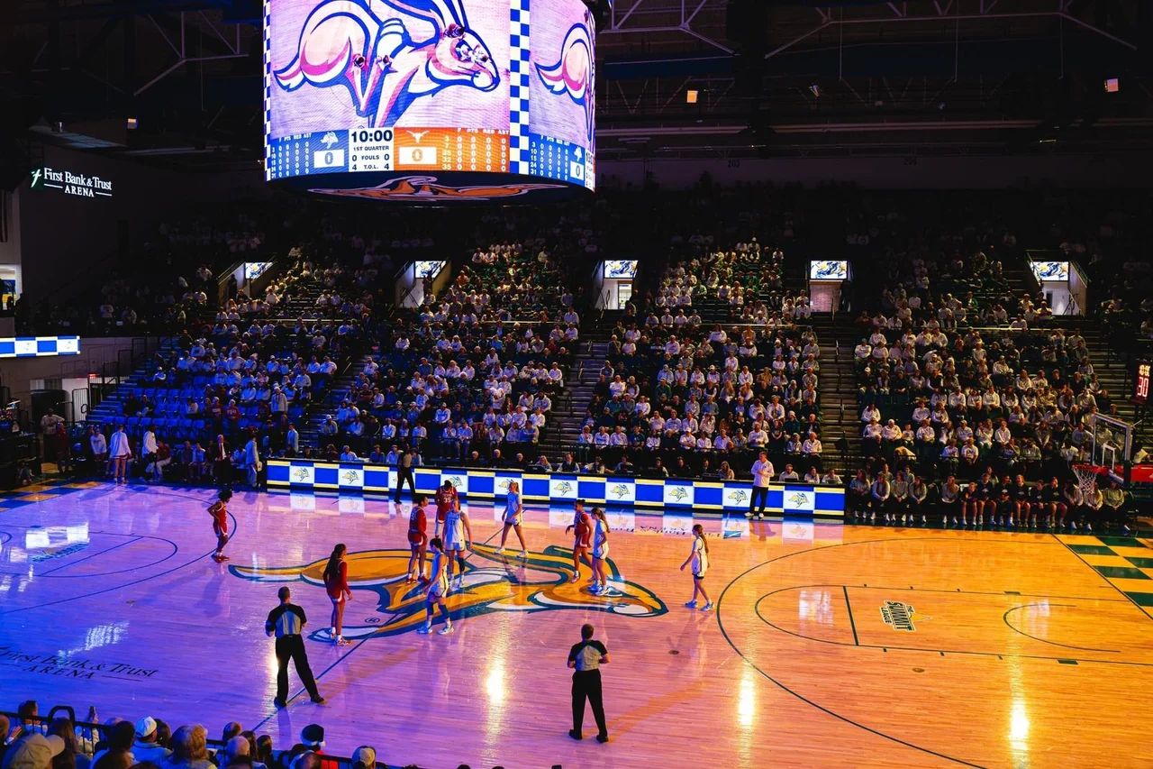 South Dakota State Jackrabbits women's basketball: wide view of the basketball arena and center-court video board