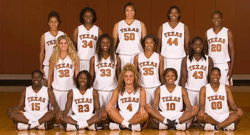 Archival Texas Longhorns women's basketball team photo with players posing in orange and white uniforms