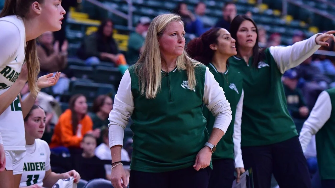Wright State Raiders women's basketball: coach directing players from the sideline